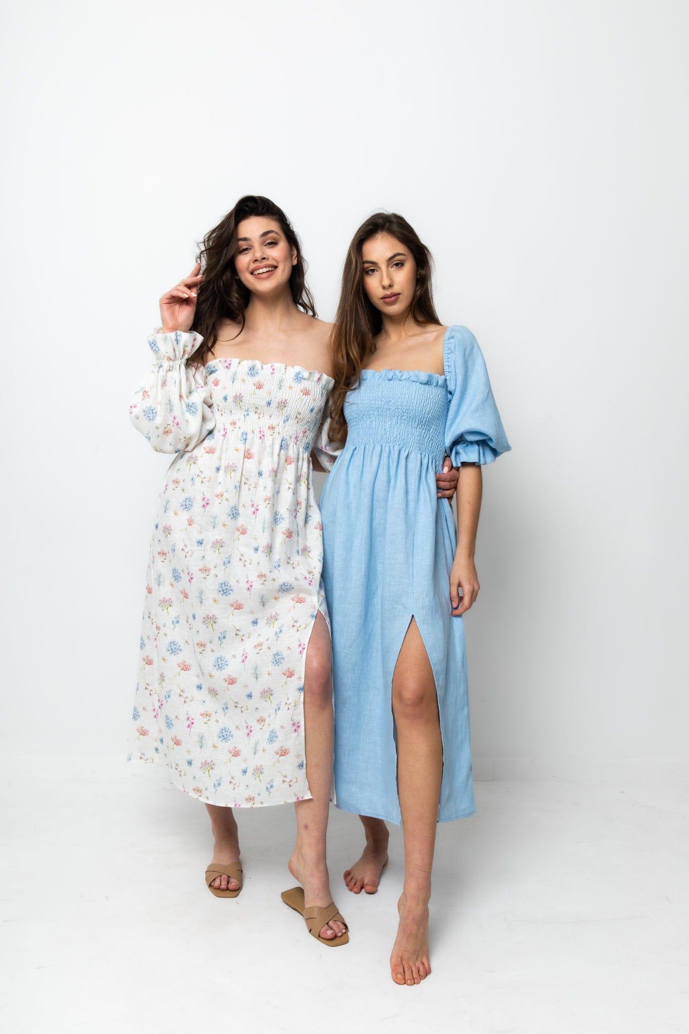 happy models in floral midi dress