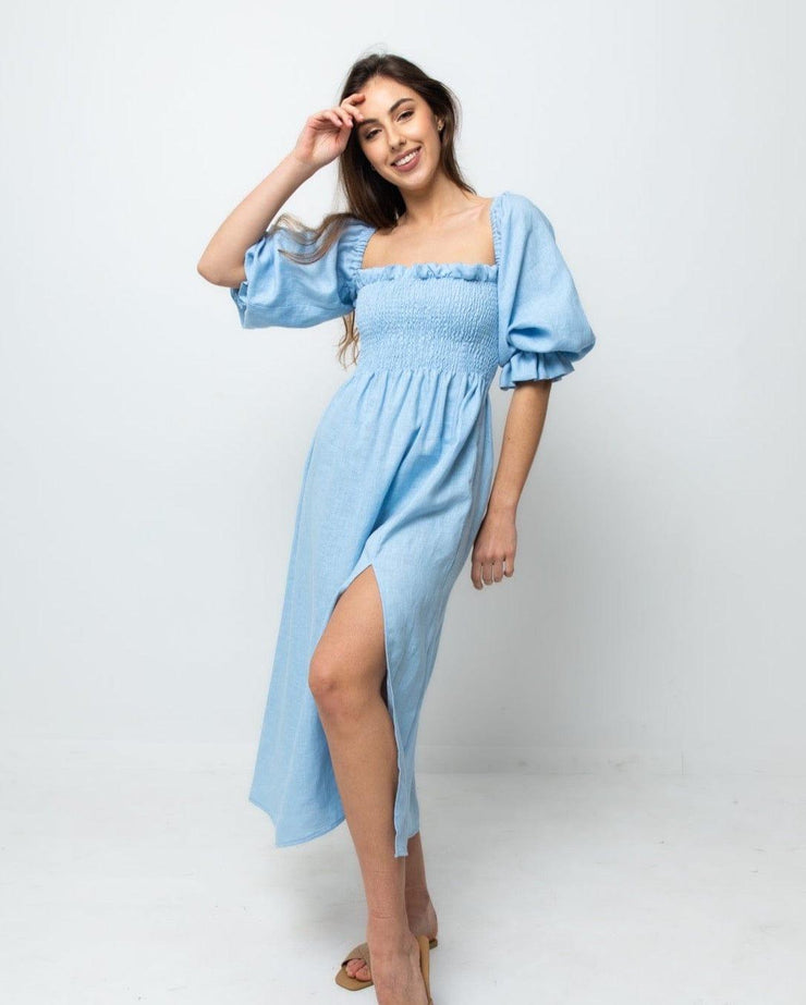 model wearing baby blue dress